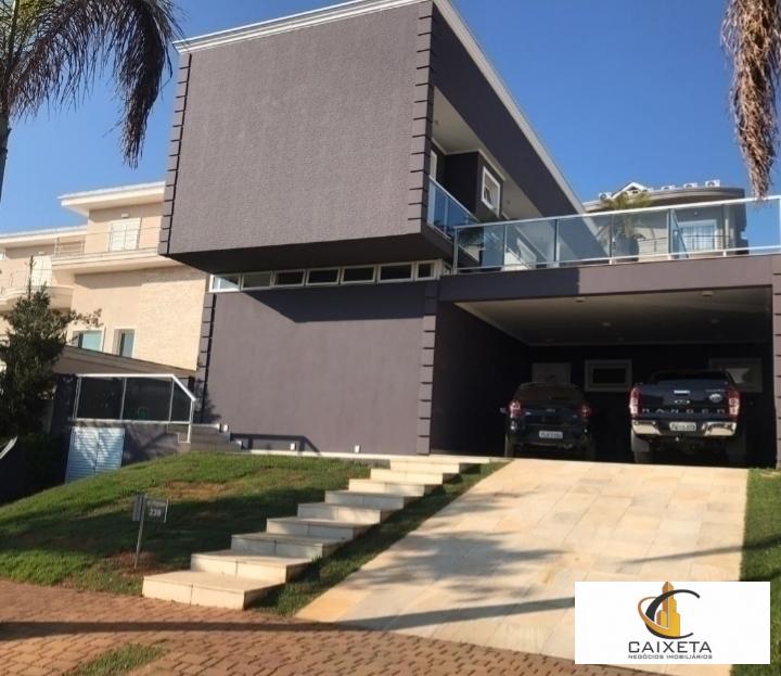 Casa de Condomínio à venda com 4 quartos, 344m² - Foto 1